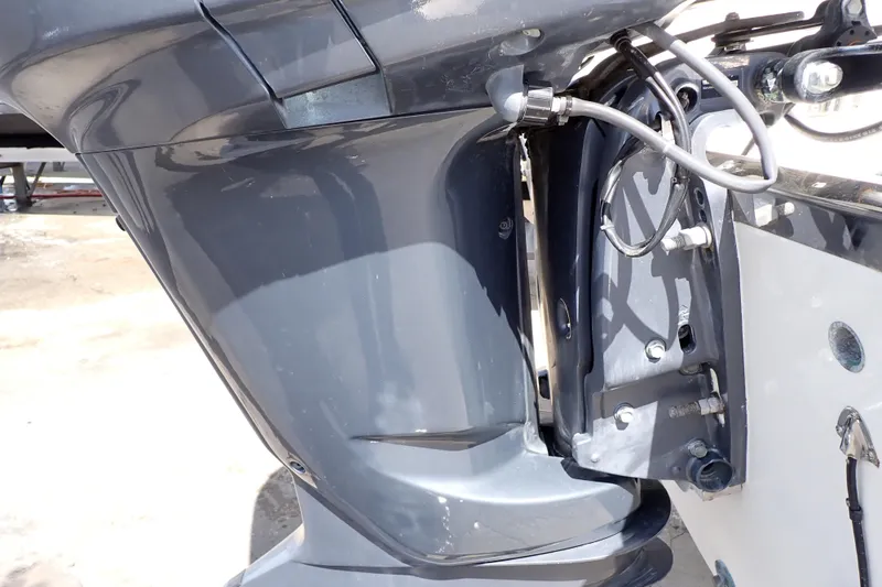 Slide: The Image of Close-up of a 2006 Robalo R220 Center Console boat engine detail. - 56