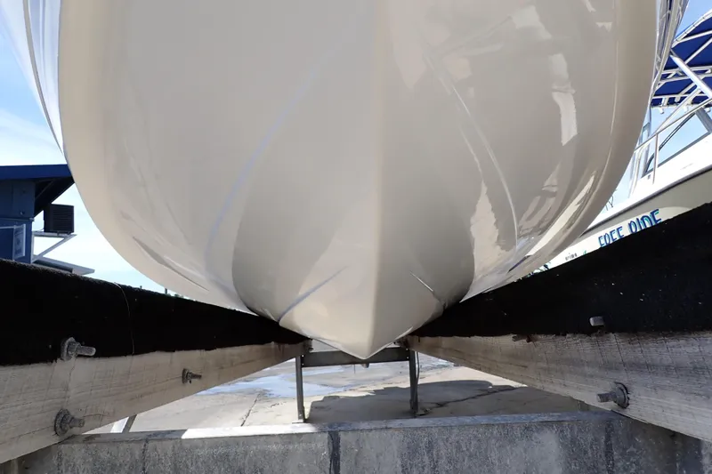 Slide: The Image of 2006 Robalo R220 Center Console boat hull on dry dock. - 70