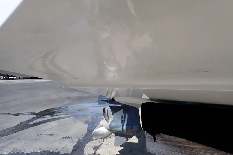 Slide: The Image of 2006 Robalo R220 Center Console boat hull and propeller detail. - 75