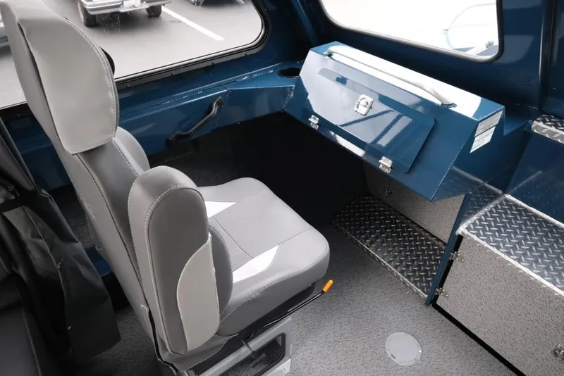 Slide: The Image of Interior of 2026 Hewescraft 240 Ocean Pro ET Hardtop, featuring seating and storage. - 14