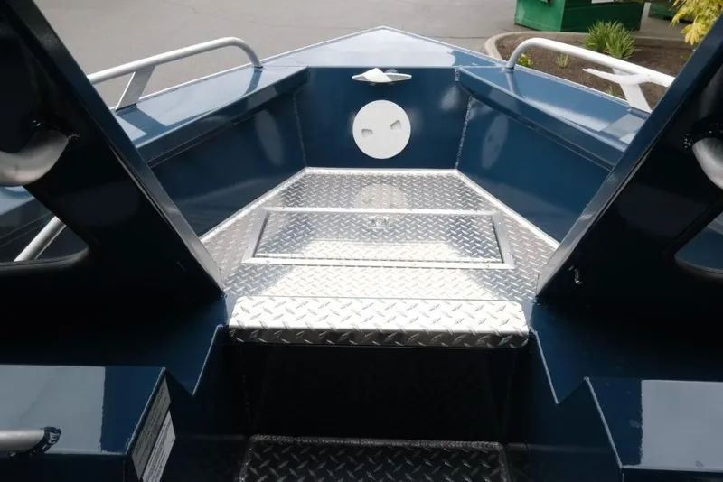 Slide: The Image of 2026 Hewescraft 240 Ocean Pro ET Hardtop boat interior with diamond plate flooring. - 15