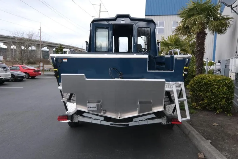 Slide: The Image of 2026 Hewescraft 240 Ocean Pro ET Hardtop boat, rear view in parking lot. - 5