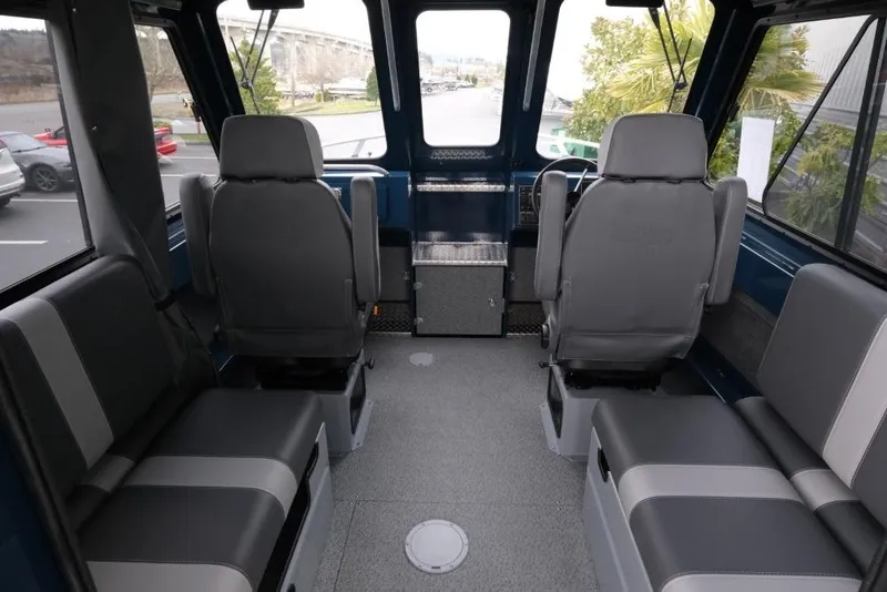 Slide: The Image of Interior of 2026 Hewescraft 240 Ocean Pro ET Hardtop, featuring spacious seating and modern design. - 9
