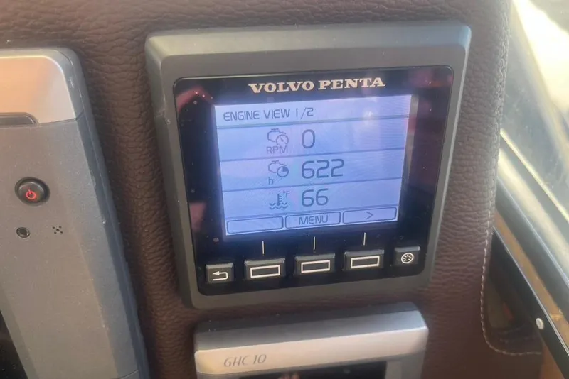 Slide: The Image of Volvo Penta engine display on 2013 Cutwater C-28 boat, showing RPM and temperature. - 11
