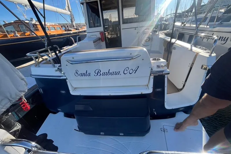 Slide: The Image of 2013 Cutwater C-28 boat docked, featuring "Santa Barbara, CA" on the stern. - 27