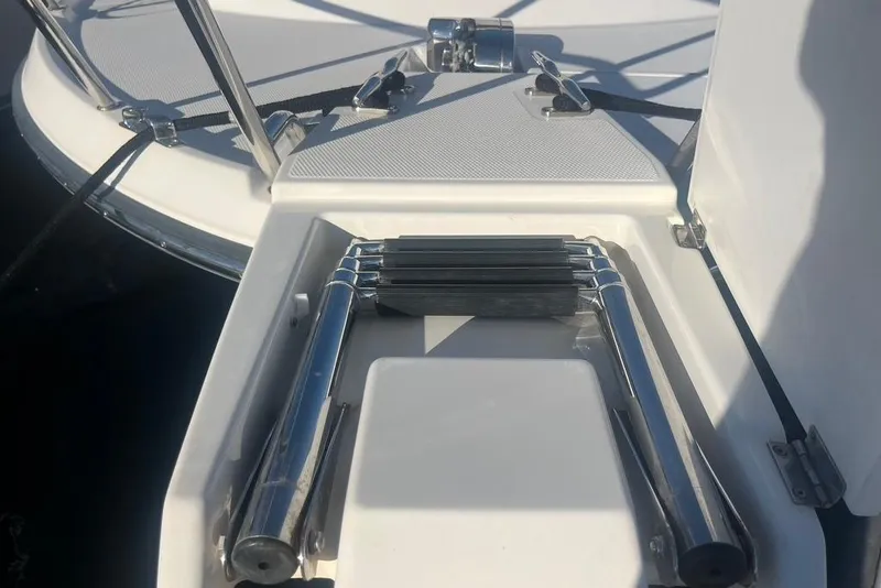 Slide: The Image of Foldable ladder on a 2013 Cutwater C-28 boat deck. - 31