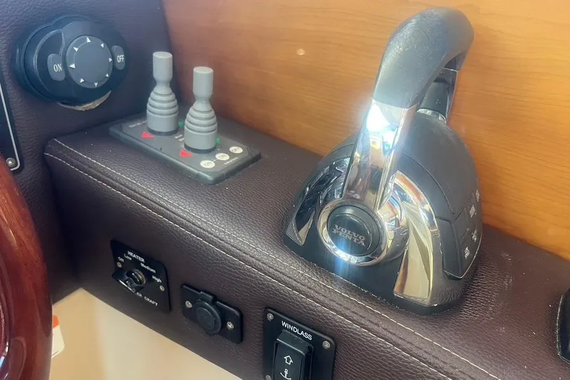 Slide: The Image of Control panel of a 2013 Cutwater C-28 boat featuring Volvo Penta throttle. - 4