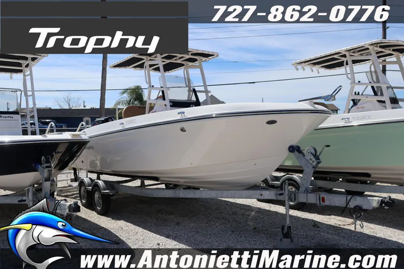 The Image of 2026 Bayliner Trophy T22CC boat on trailer at Antonietti Marine dealership. - 1