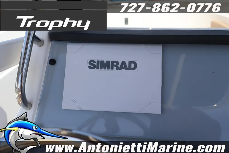 Slide: The Image of 2026 Bayliner Trophy T22CC dashboard featuring Simrad electronics and Antonietti Marine branding. - 9