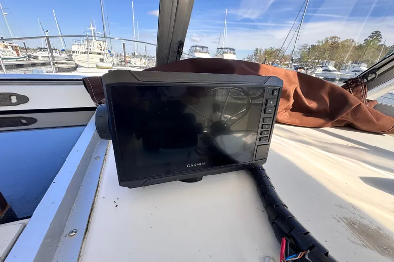 Slide: The Image of Garmin marine GPS on 1987 Luhrs Alura 30 boat, docked in marina. - 26