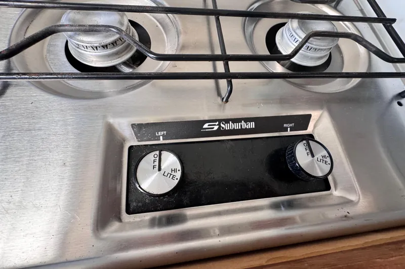 Slide: The Image of Stainless steel Suburban stove with dual burners on a 1987 Luhrs Alura 30 boat. - 39
