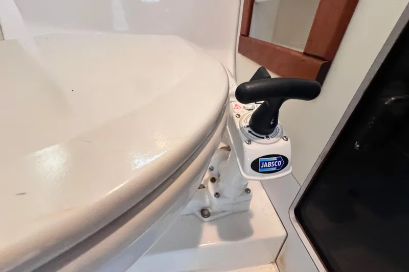 Slide: The Image of Jabsco marine toilet in 1987 Luhrs Alura 30 boat bathroom. - 52
