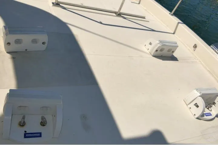 Slide: The Image of Deck of 1999 Hampton 490 Pilothouse yacht with mounted equipment. - 64