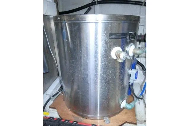Slide: The Image of Stainless steel water heater in a 1999 Hampton 490 Pilothouse boat. - 82