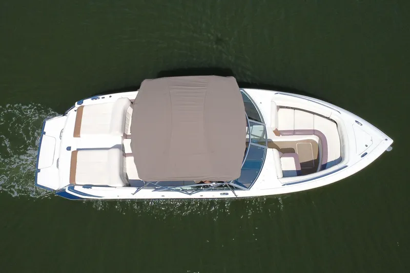 Slide: The Image of Overhead view of 2012 Cobalt 296 boat with canopy on water. - 10