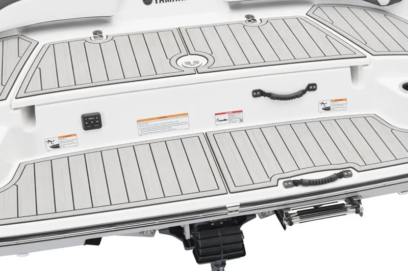 Slide: The Image of Manufacturer Provided Image: 2026 Yamaha Boats SX190 swim platform with teak-style decking and safety handles. - 3