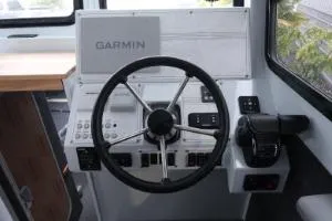 Slide: The Image of Helm of 2026 Hewescraft 290 Adventure ET Hardtop with Garmin navigation system. - 13