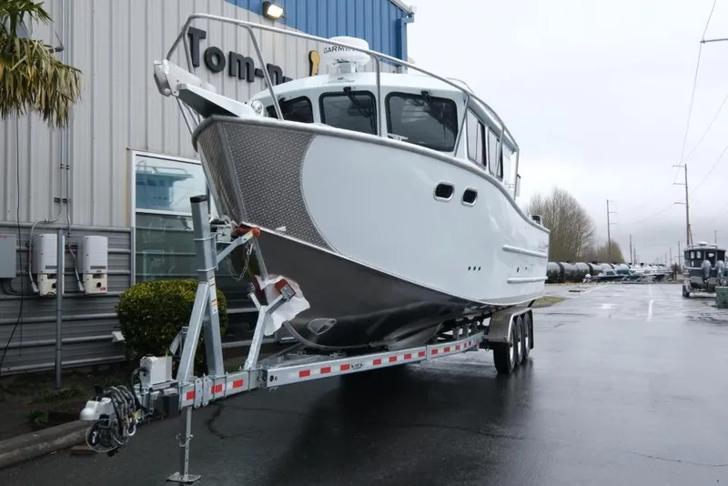 Slide: The Image of 2026 Hewescraft 290 Adventure ET Hardtop boat on trailer outside dealership. - 3