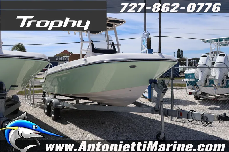 The Image of 2026 Bayliner Trophy T20CC boat on trailer at Antonietti Marine dealership. - 1