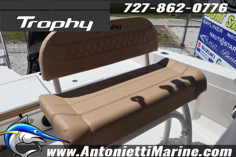 Slide: The Image of 2026 Bayliner Trophy T20CC boat seat with logo and contact details. - 15