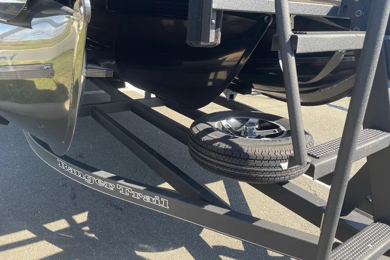 Slide: The Image of Trailer with spare tire for 2024 Ranger 2500LS boat, labeled "Ranger Trail." - 6