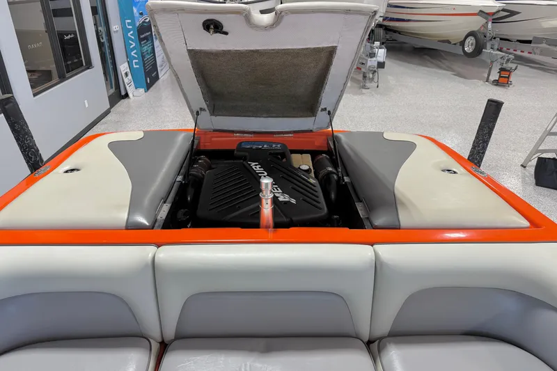 Slide: The Image of 2005 Calabria PRO V boat engine compartment with open hatch in showroom. - 18