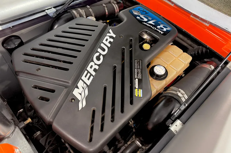 Slide: The Image of 2005 Calabria PRO V engine compartment with Mercury 8.1S motor, showcasing performance components. - 19