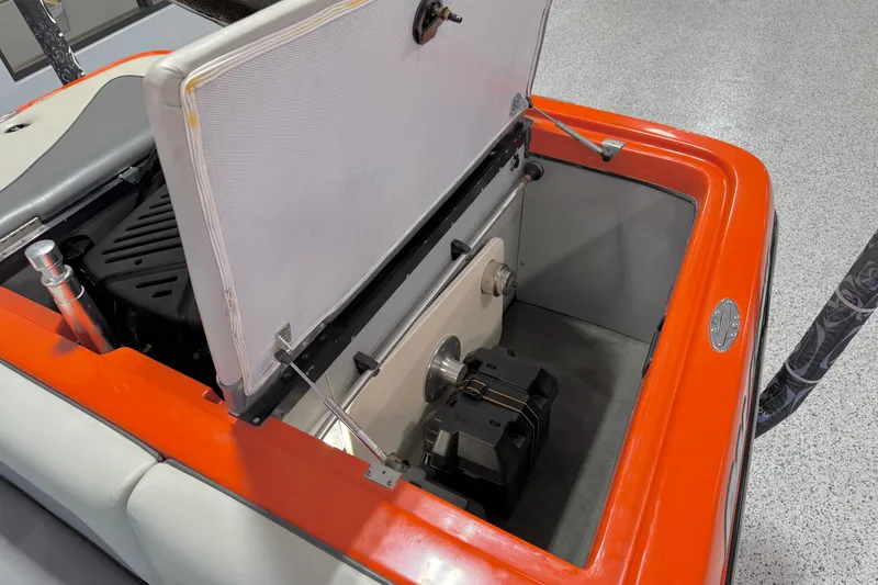 Slide: The Image of Open engine compartment of 2005 Calabria PRO V boat, showcasing interior components. - 20