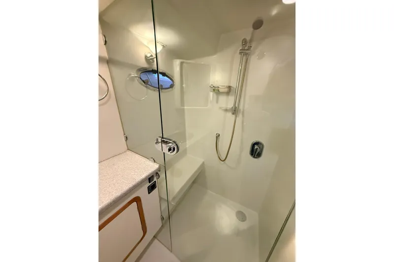 Slide: The Image of Luxurious bathroom in 2002 Norris Custom Motor Catamaran 41.4 with glass shower enclosure. - 102