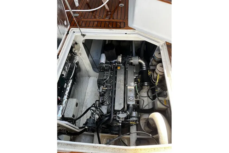 Slide: The Image of Engine compartment of a 2002 Roger Hill Power Cat, showcasing detailed mechanical components. - 121