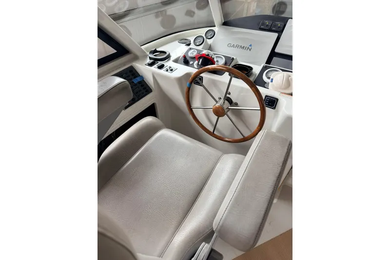 Slide: The Image of Helm of 2002 Norris Custom Motor Catamaran 41.4 with Garmin navigation system. - 20