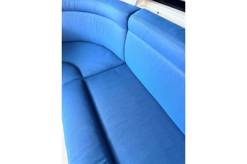Slide: The Image of Blue seating on 2002 Norris Custom Motor Catamaran 41.4, showcasing luxurious marine upholstery. - 27