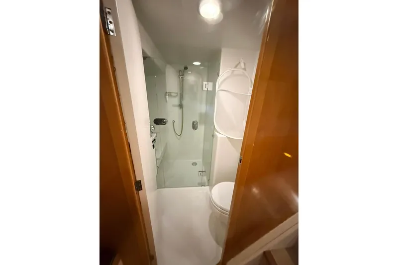 Slide: The Image of Bathroom interior of 2002 Norris Custom Motor Catamaran 41.4 with shower and toilet. - 88