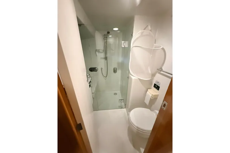 Slide: The Image of Bathroom interior of 2002 Norris Custom Motor Catamaran 41.4 with shower and toilet. - 96