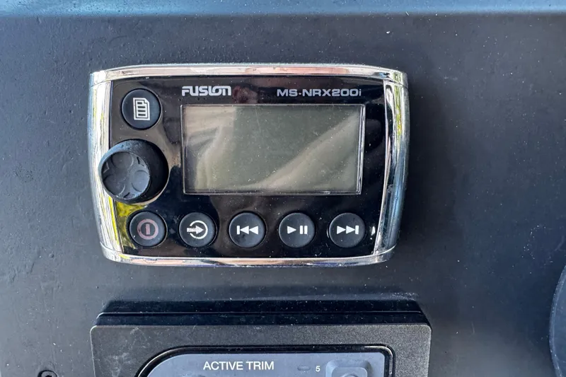Slide: The Image of Fusion MS-NRX200i marine stereo on 2017 Axopar 37 Sun Top dashboard. - 27