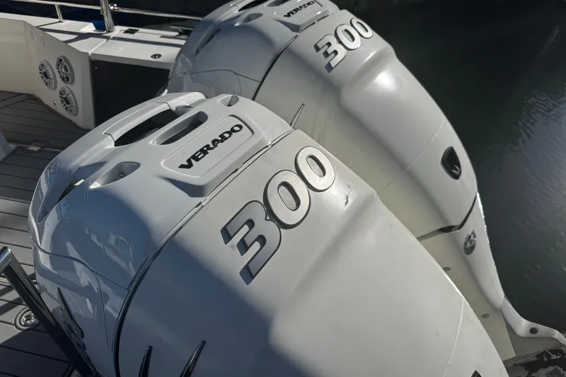 Slide: The Image of Twin 300 horsepower Verado engines on a 2017 Axopar 37 Sun Top boat. - 46