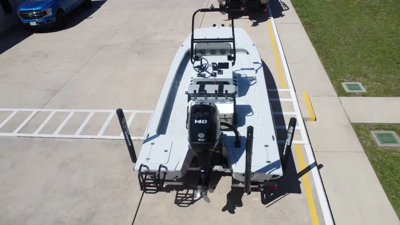 Slide: The Image of Aerial view of a 2024 Majek 21RFL boat on a trailer. - 14