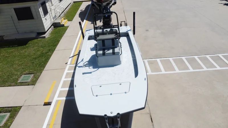 Slide: The Image of 2024 Majek 21RFL boat parked on a lot. - 18