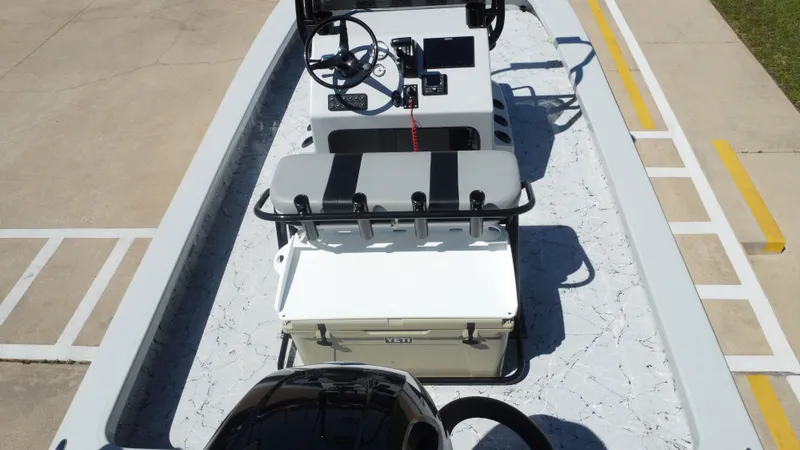 Slide: The Image of Interior view of 2024 Majek 21RFL boat with steering console. - 24