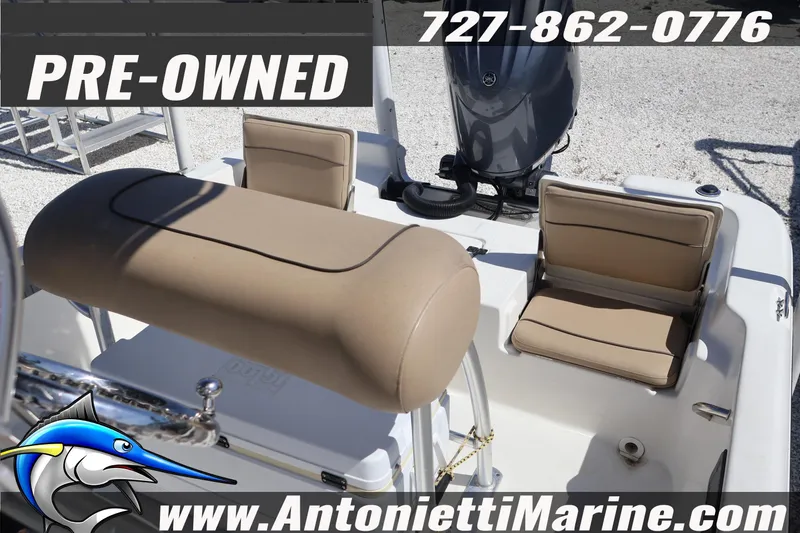 Slide: The Image of Pre-owned 2018 NauticStar 2140 Sport boat interior with seating, available at Antonietti Marine. - 14