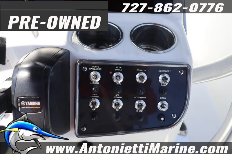 Slide: The Image of Control panel of a pre-owned 2018 NauticStar 2140 Sport boat with Yamaha throttle. - 18