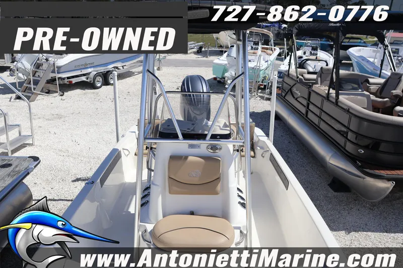 Slide: The Image of Pre-owned 2018 NauticStar 2140 Sport boat at Antonietti Marine dealership. - 9