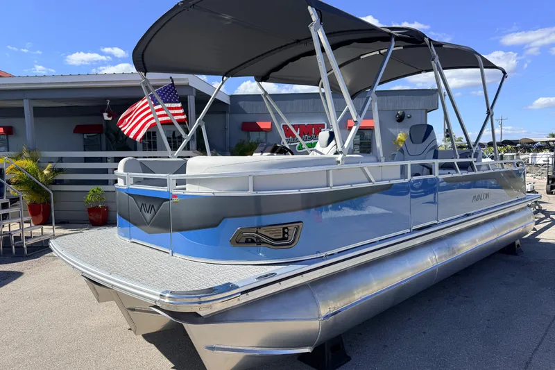 The Image of 2026 Avalon 2585 Venture 85 VRB Tri Toon boat with canopy and American flag. - 1
