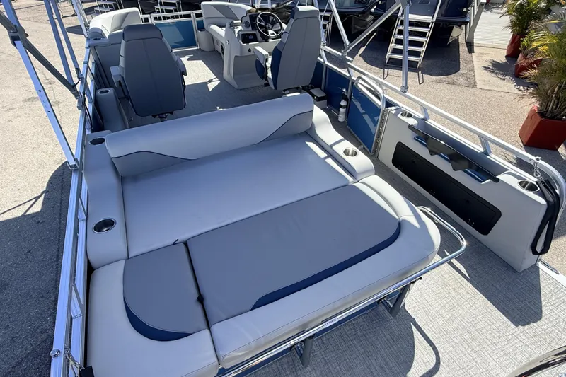 Slide: The Image of 2026 Avalon 2585 Venture 85 VRB Tri Toon boat interior with seating and steering console. - 11