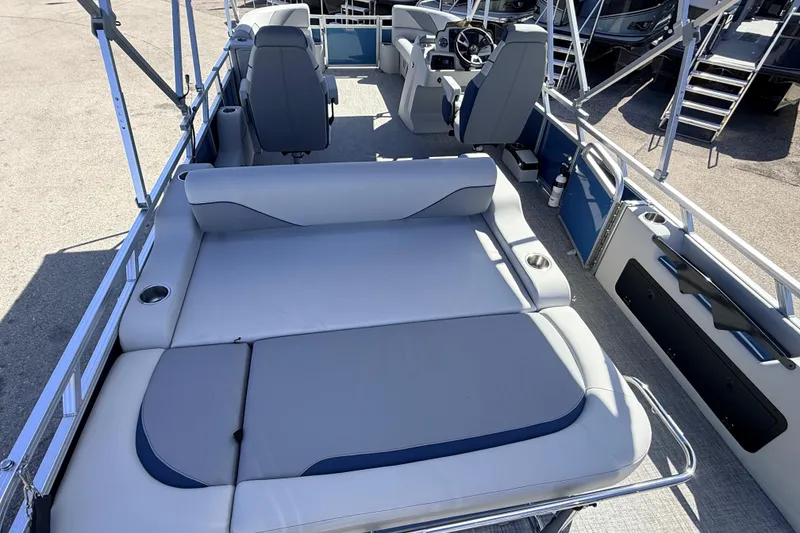 Slide: The Image of 2026 Avalon 2585 Venture 85 VRB Tri Toon boat interior with seating and steering console. - 12