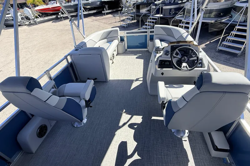 Slide: The Image of 2026 Avalon 2585 Venture 85 VRB Tri Toon boat interior with plush seating and modern helm. - 14