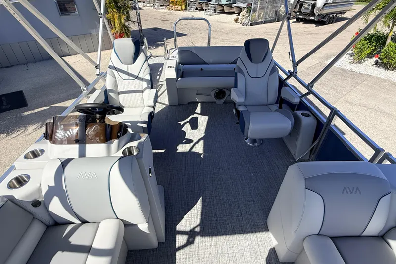 Slide: The Image of Luxurious interior of 2026 Avalon 2585 Venture 85 VRB Tri Toon boat, featuring plush seating. - 17
