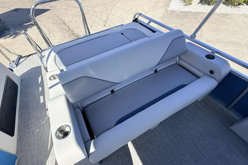 Slide: The Image of 2026 Avalon 2585 Venture 85 VRB boat interior with gray seating and cup holders. - 19