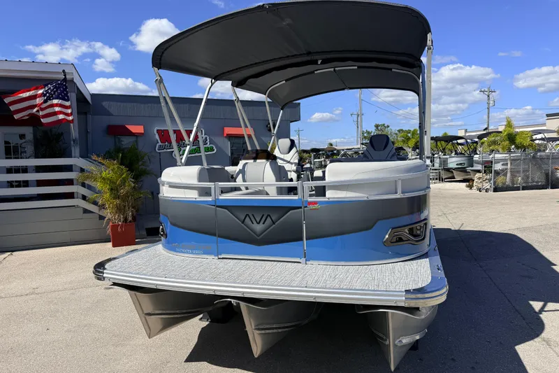 Slide: The Image of 2026 Avalon 2585 Venture 85 VRB Tri Toon boat, high performance, parked outdoors. - 3