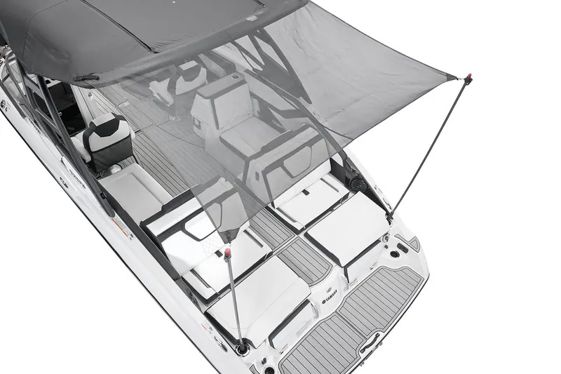 Slide: The Image of Manufacturer Provided Image: 2026 Yamaha Boats 252SE interior with canopy, showcasing seating and deck layout. - 9
